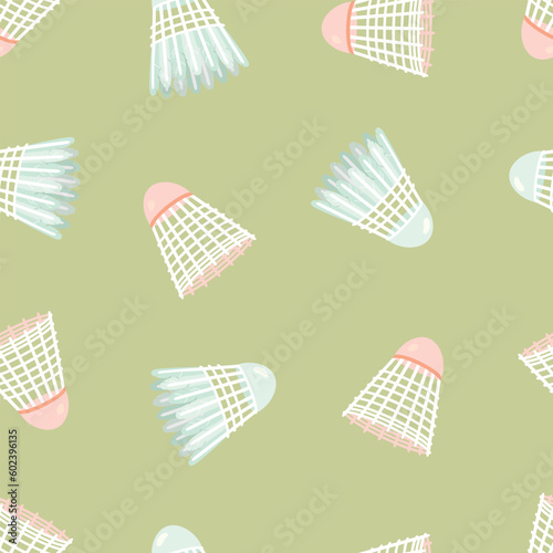 Badminton shuttlecock seamless pattern in color.Sports equipment is plastic and feather. Objects are located randomly on green.Background for printing on fabric and paper.Vector flat illustration.