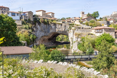a view of Puentedey village over the natural bridge on the Nela river, Merindad de Valdeporres, province of Burgos, Castile and León, Spain