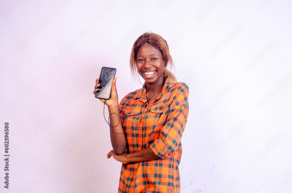 african lady feeling excited about what she saw on her phone african lady feeling excited about what she saw on her phone