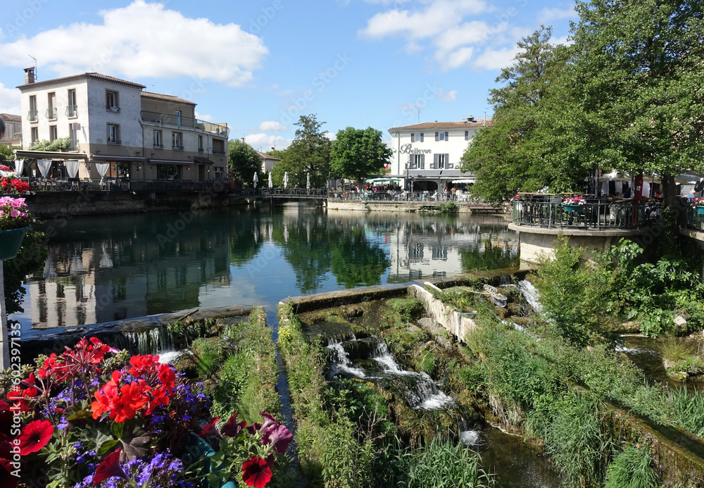 L'Isle-sur-la-Sorgue, Vaucluse, France: landscape at dawn of the town surrounded of the water canals..