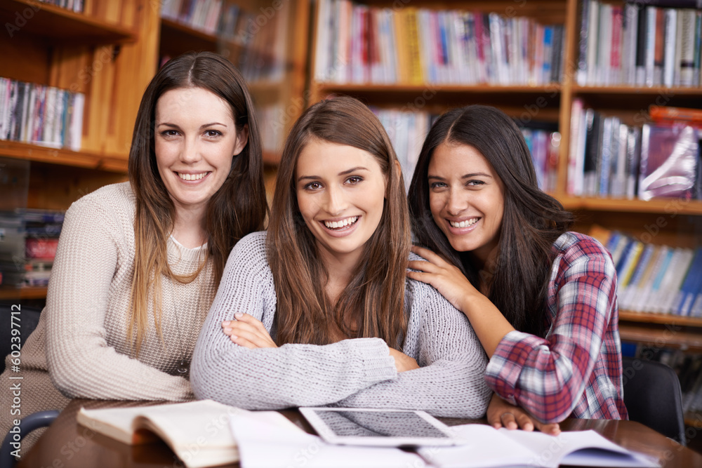 University, friends and portrait of women in library for online research, studying and learning. Education, academy and happy female students with books for knowledge, internet and school project University, friends and portrait of women in library for online research, studying and learning. Education, academy and happy female students with books for knowledge, internet and school project