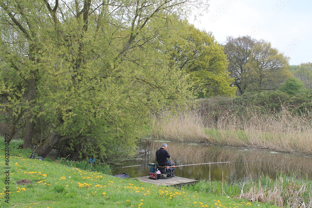 Fishermen fishing on the Selby Canal North Yorkshire in the UK Fishermen fishing on the Selby Canal North Yorkshire in the UK