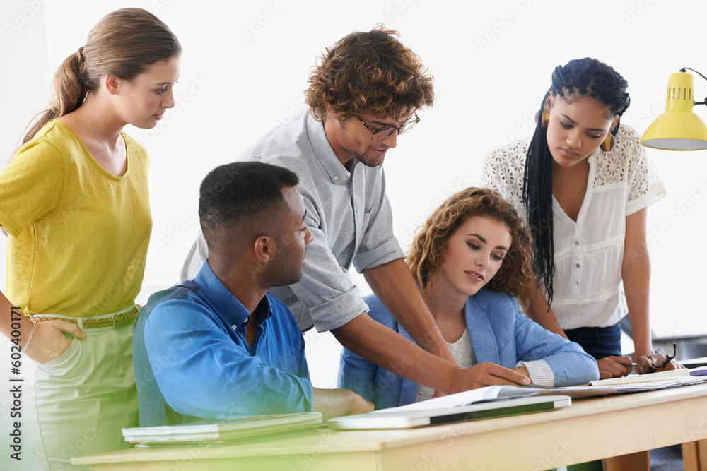 Businessman, coaching and documents in teamwork planning for strategy and collaboration at office. Business people listening to help or mentor training staff in diversity group project at workplace Businessman, coaching and documents in teamwork planning for strategy and collaboration at office. Business people listening to help or mentor training staff in diversity group project at workplace