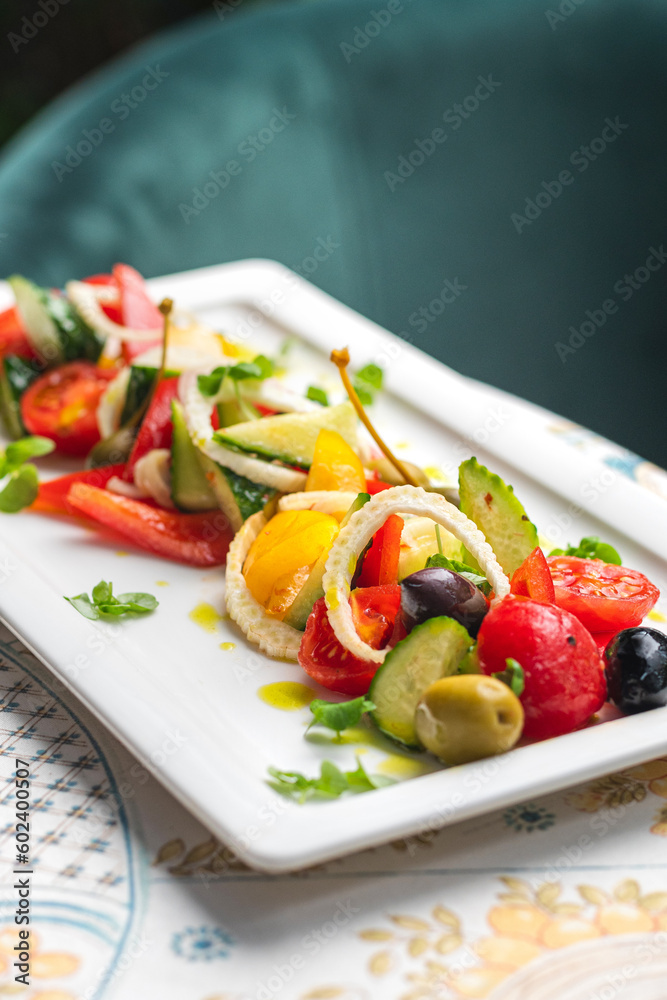 Salad with tomato, italian ricotta cheese and basil