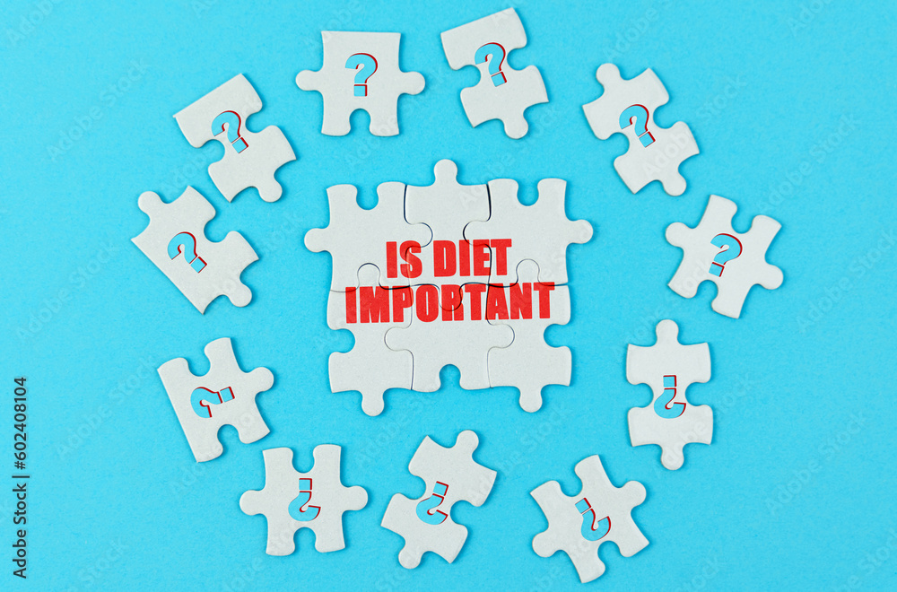 On a blue surface are puzzles with a question mark, in the center with the inscription - Is diet important On a blue surface are puzzles with a question mark, in the center with the inscription - Is diet important