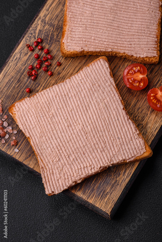 Delicious crispy toast with chicken or goose pate with salt and spices