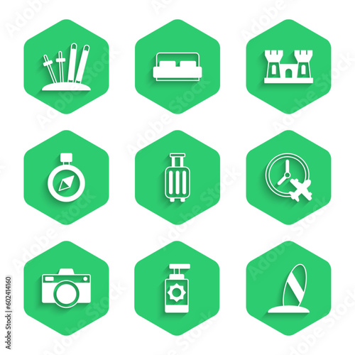 Set Suitcase, Sunscreen spray bottle, Surfboard, Clock with airplane, Photo camera, Compass, Sand castle and Ski sticks icon. Vector