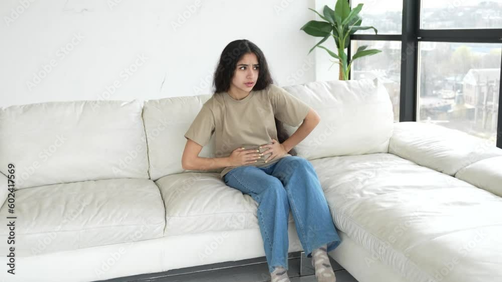 Attack of diarrhea with young woman who suddenly has a stomach-ache and runs out of the room Attack of diarrhea with young woman who suddenly has a stomach-ache and runs out of the room