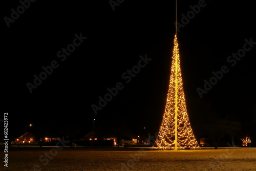 Christmas tree. Outside in December. Night photo. Sweden 2022.