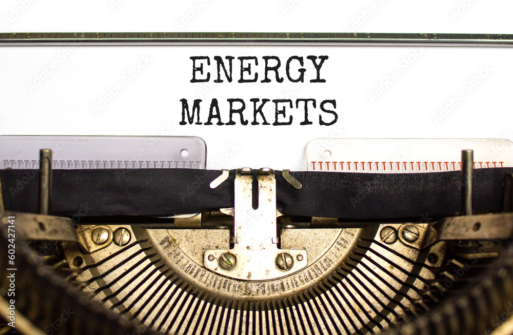 Energy markets symbol. Concept words Energy markets typed on white paper on old retro typewriter. Beautiful white background. Business energy markets concept. Copy space.