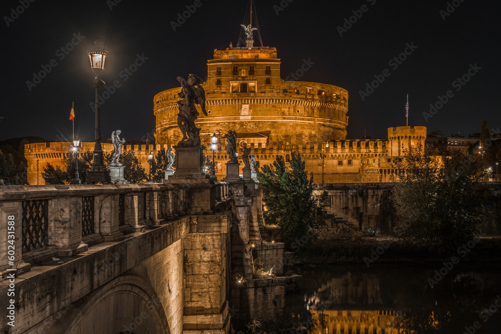 Night view of Castel Sant’Angelo on the bank of the Tiber River, Rome, Italy