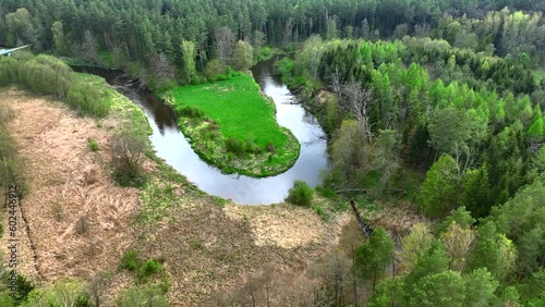 Top view of small river Lyna flowing in Warmia, northern Poland, Europe photo