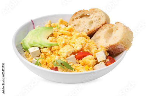 Bowl with delicious scrambled eggs, tofu, avocado and slices of baguette isolated on white