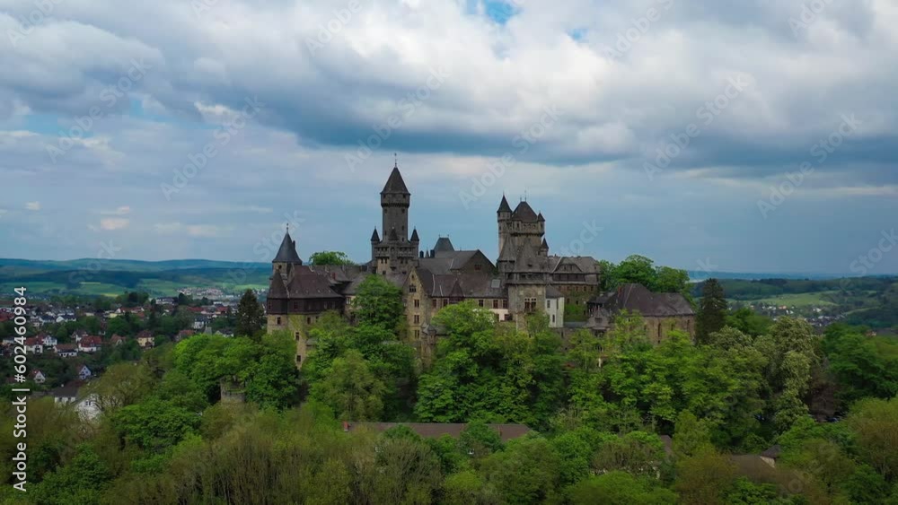 Aerial drone view medieval neo-gothic Braunfels castle on top of hill on gloomy rainy day. Hessen, Germany. High quality 4k footage Aerial drone view medieval neo-gothic Braunfels castle on top of hill on gloomy rainy day. Hessen, Germany. High quality 4k footage