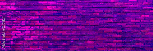 Long Panorama Of Purple Or Lilac Brick Wall With Vignette. Purple Brick Wall As Background To Place Text Or Graffiti. Copy Space And Abstract Web Banner.