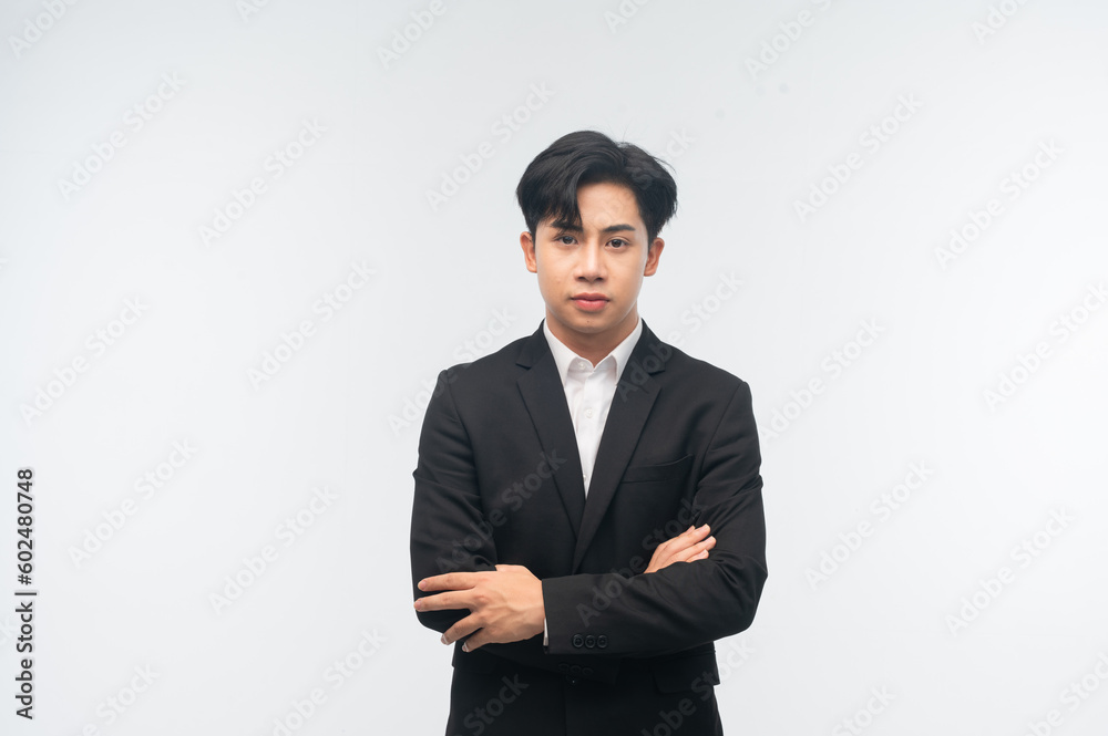 Portrait of smiling businessman standing on white background. Portrait of smiling businessman standing on white background.