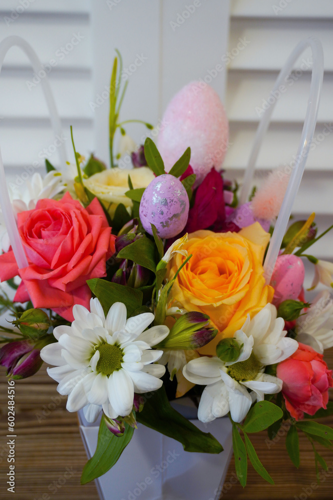 Happy easter! Flat Lay, Internet banner, postcard on Easter. Bouquet of flowers and Easter eggs Happy easter! Flat Lay, Internet banner, postcard on Easter. Bouquet of flowers and Easter eggs