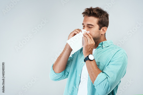 Принти на полотні Allergy, sick and man blowing nose in tissue with flu, illness and virus on studio background