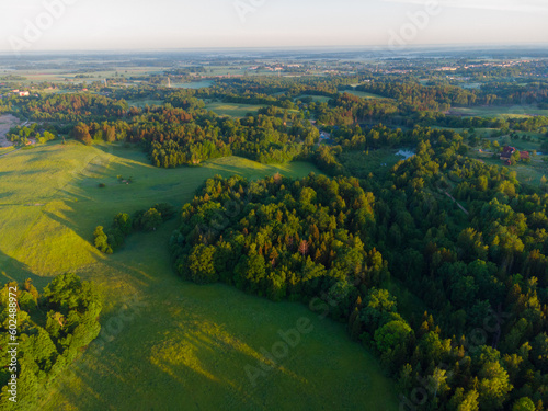 Mystical Sunrise Drone View of Lush Green Landscape of Northern Europe