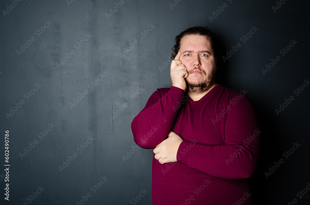 Business and work. Funny fat man posing in the studio. Business and work. Funny fat man posing in the studio.