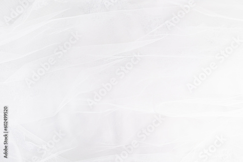 Cuadro en lienzo Wedding white background part of the veil with pleats