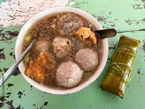 Close up delicious pork Meatball Soup in a bowl on wood
