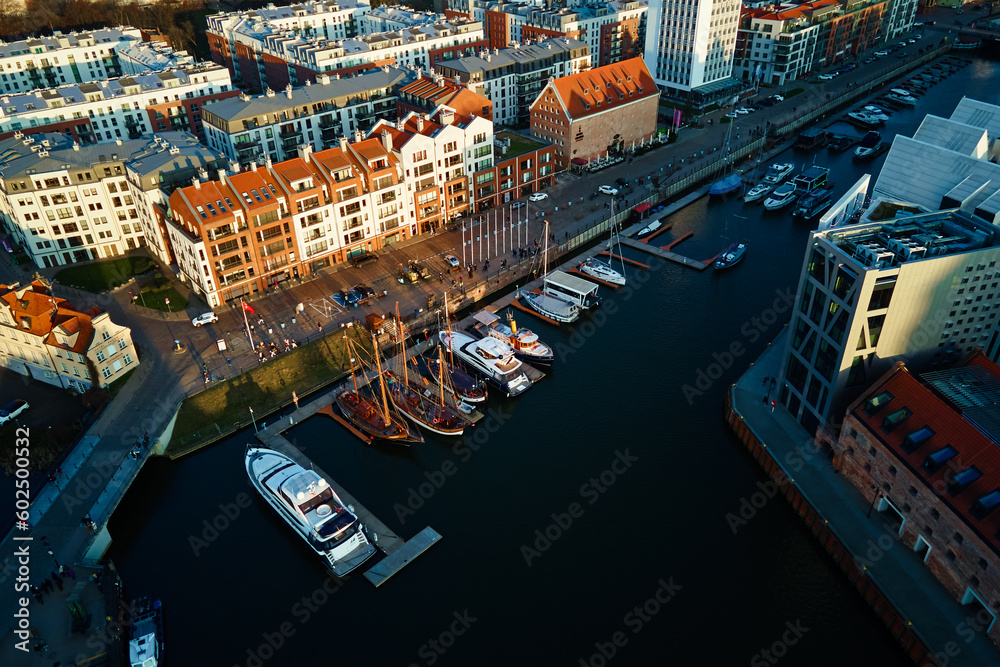 Fototapeta premium Gdansk city in Poland with view on Motlaca river. Historical center in old town in european city, aerial view. Panoramic skyline of modern european city