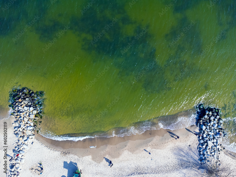 Aerial view landscape Poland Gdynia. View of beach and Baltic sea, sand, stones. Photo from a drone.