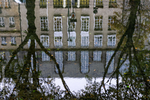 Reflections of buildongs and trees photo