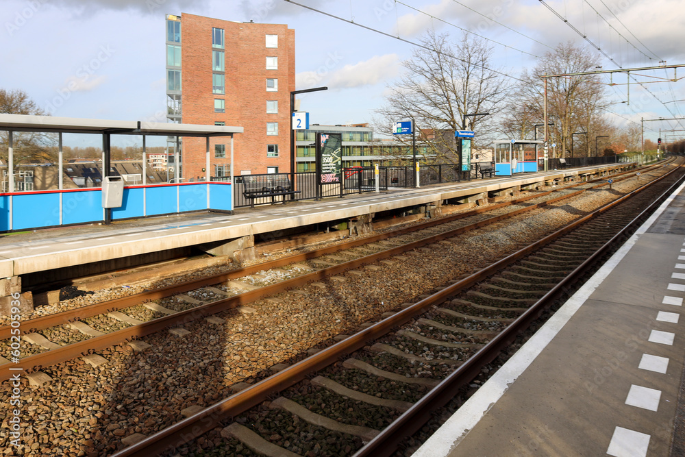 Platforms and railroad tracks at train station Nieuwerkerk aan den IJssel