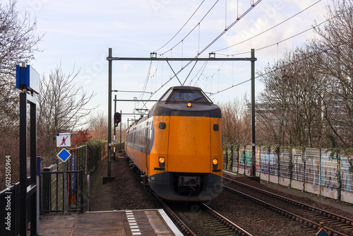 ICM koploper intercity along platform of train station Nieuwerkerk aan den IJssel