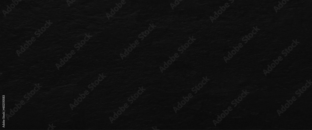 Natural black slate stone background pattern with high resolution. Top view, copy space.