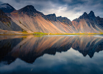 Papier peint photo Pantone 2025 Mocha Mousse Majestic summer scene of Stokksnes headland with Vestrahorn (Batman Mountain) on background. Unbelievable evening view of Iceland, Europe. Beauty of nature concept background.  © Andrew Mayovskyy