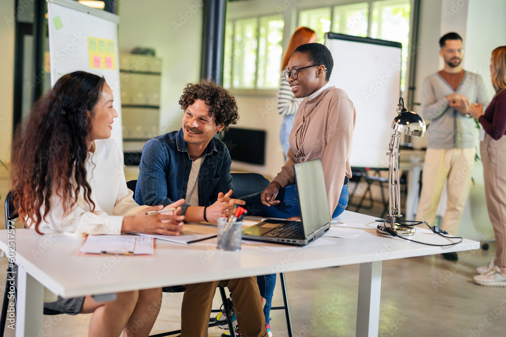Group of multiethnic business people working together in the office Group of multiethnic business people working together in the office