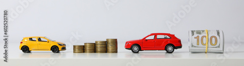 Concept of car purchase and insurance with toy car