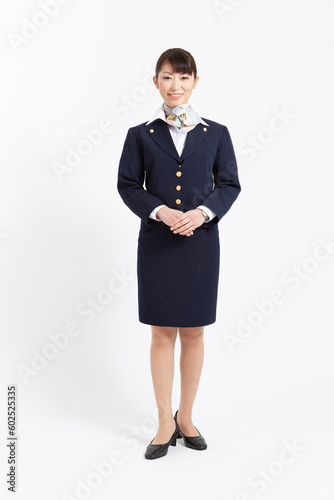 Fotografie 制服を着た笑顔の女性