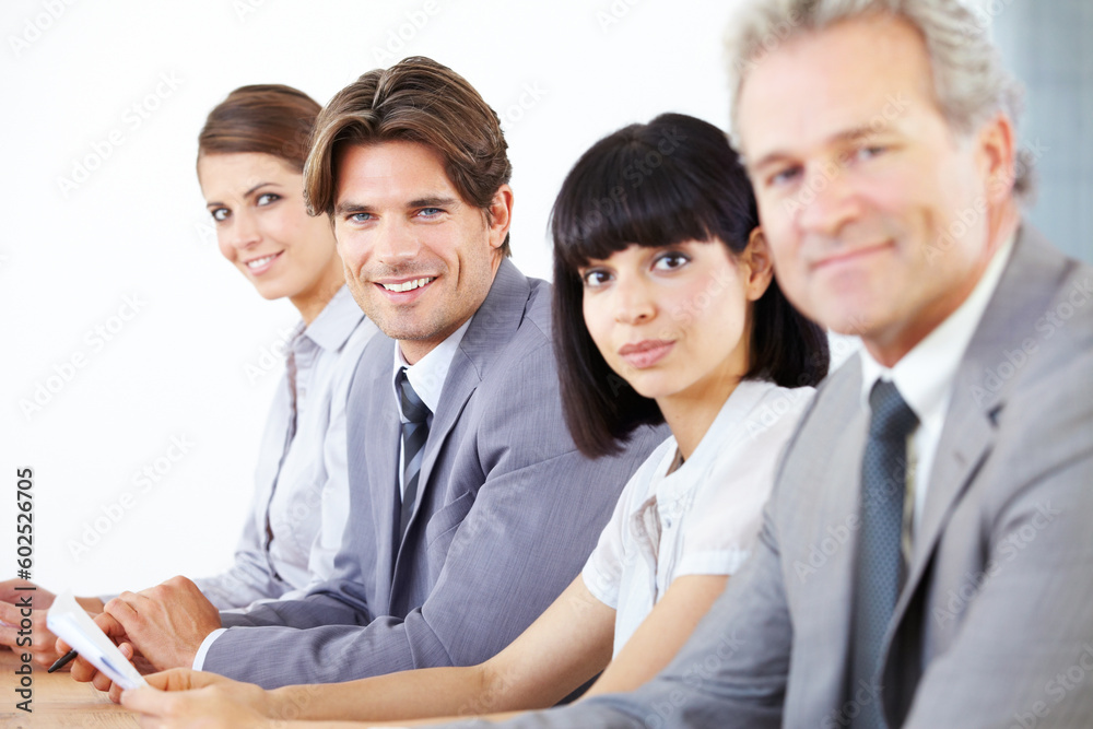 Portrait, collaboration and a team of business colleagues sitting in the boardroom for a strategy meeting. Teamwork, planning or training with corporate men and women working together in the office Portrait, collaboration and a team of business colleagues sitting in the boardroom for a strategy meeting. Teamwork, planning or training with corporate men and women working together in the office