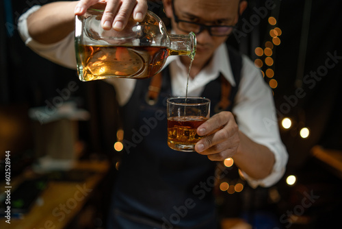 Businessmen in suits drinking Celebrate whiskey