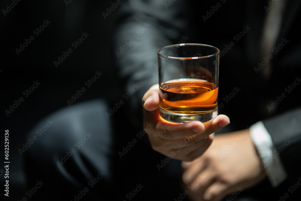 Businessmen in suits drinking  Celebrate whiskey.