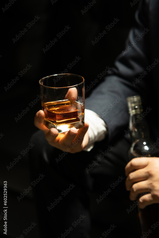 Businessmen in suits drinking Celebrate whiskey. Businessmen in suits drinking Celebrate whiskey.