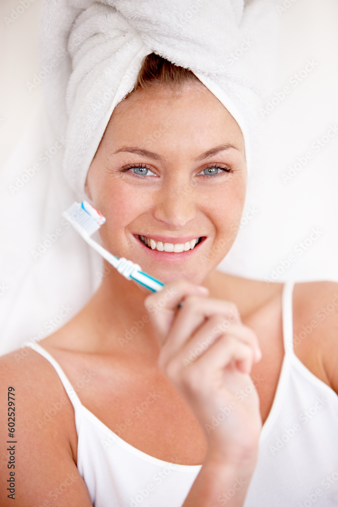 Portrait, happy woman and brushing teeth with shower towel for healthy dental wellness. Face of female person cleaning mouth with toothbrush, toothpaste and fresh breath of smile, cosmetics and care Portrait, happy woman and brushing teeth with shower towel for healthy dental wellness. Face of female person cleaning mouth with toothbrush, toothpaste and fresh breath of smile, cosmetics and care
