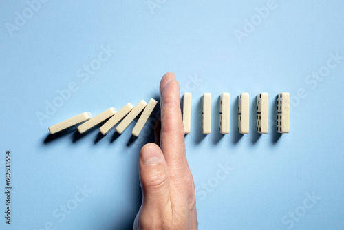 Stop the domino effect concept for business solution and intervention