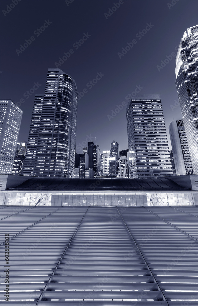 Modern office building and skyline in downtown district of Hong Kong city at dusk