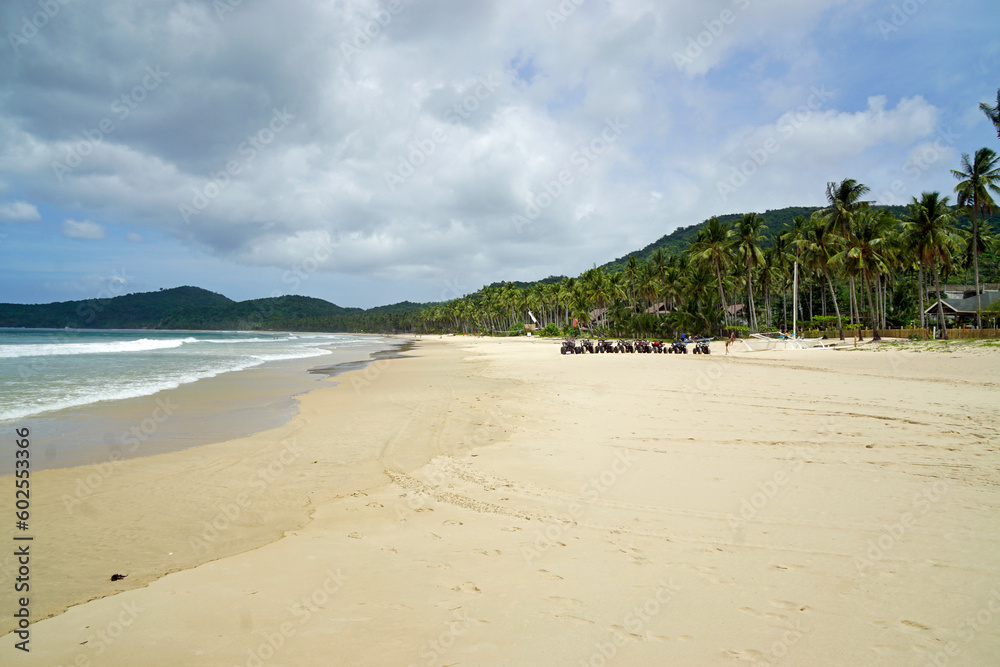 white sandy napcan beach on palawan island near el nido