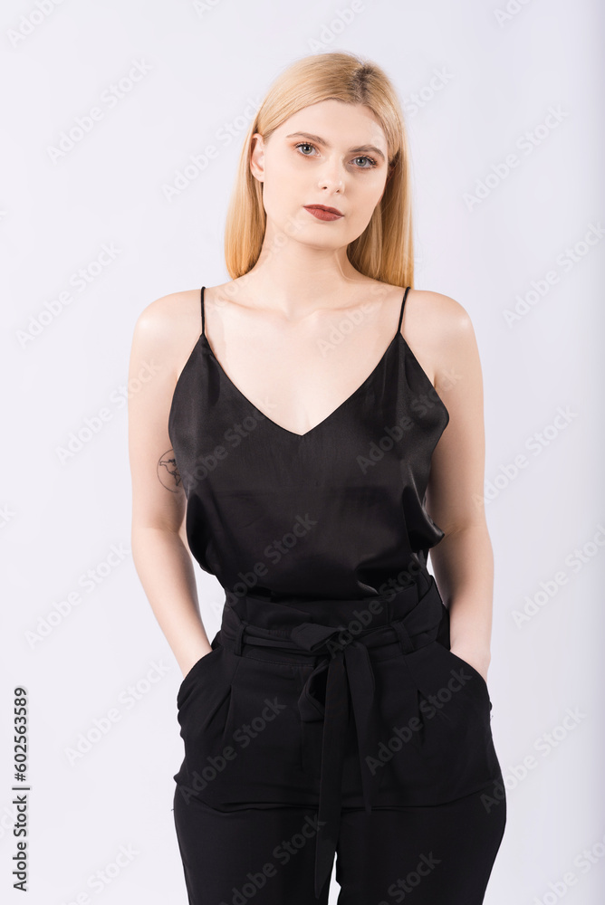 Portrait of an elegant and beautiful blonde girl on a white background Portrait of an elegant and beautiful blonde girl on a white background