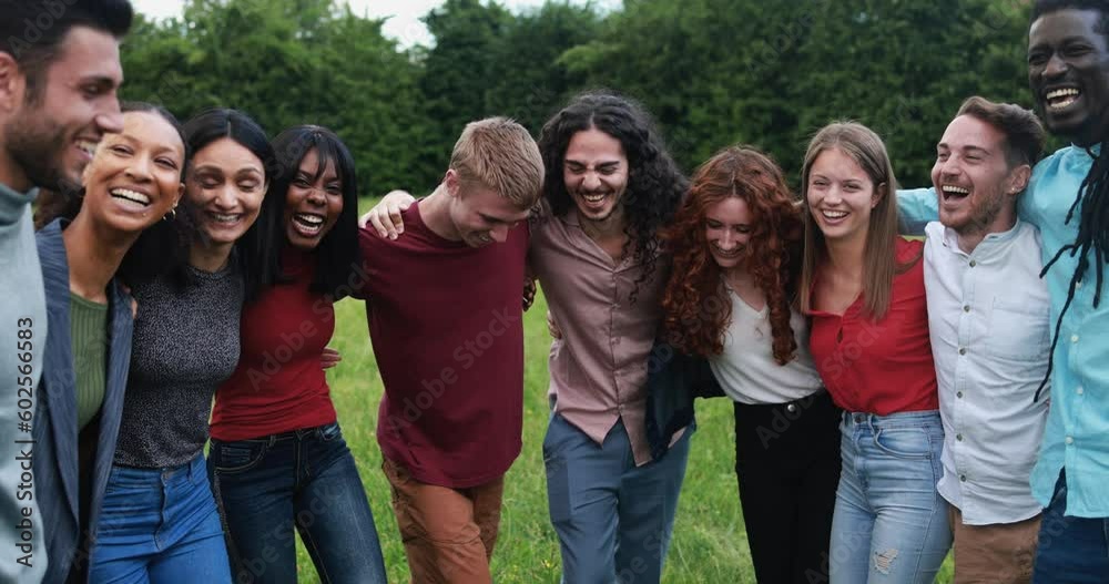 Multiracial young friends having fun hugging each other outdoor Multiracial young friends having fun hugging each other outdoor
