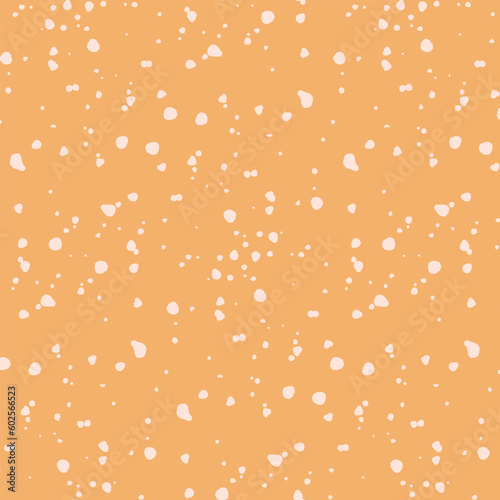 Orange background with a pattern of small dots.