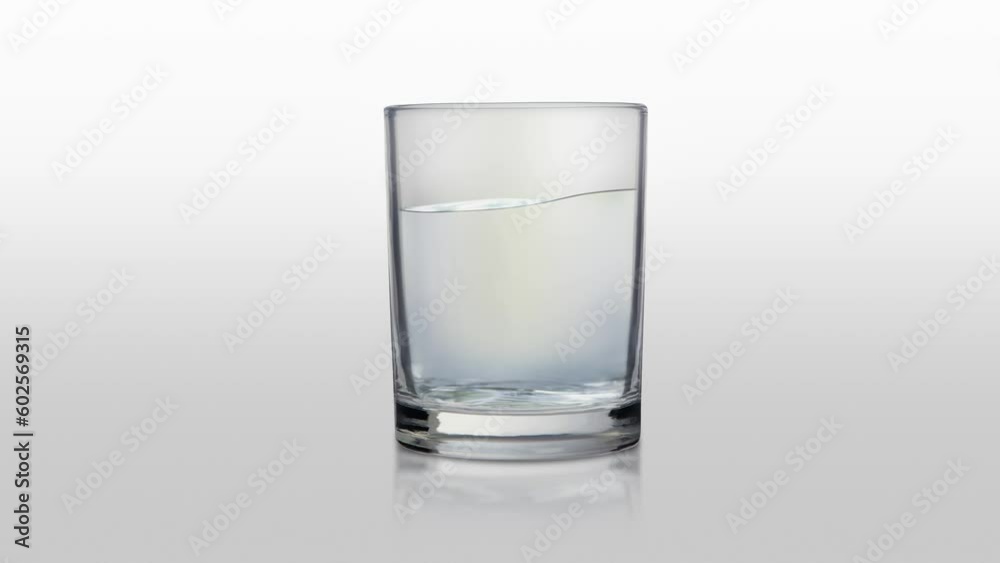 Glass with still water on a white background Glass with still water on a white background