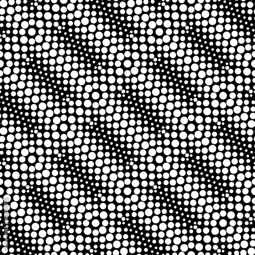 Vector seamless models. The composition of regularly repeating points, circles. Monochrome, simple.