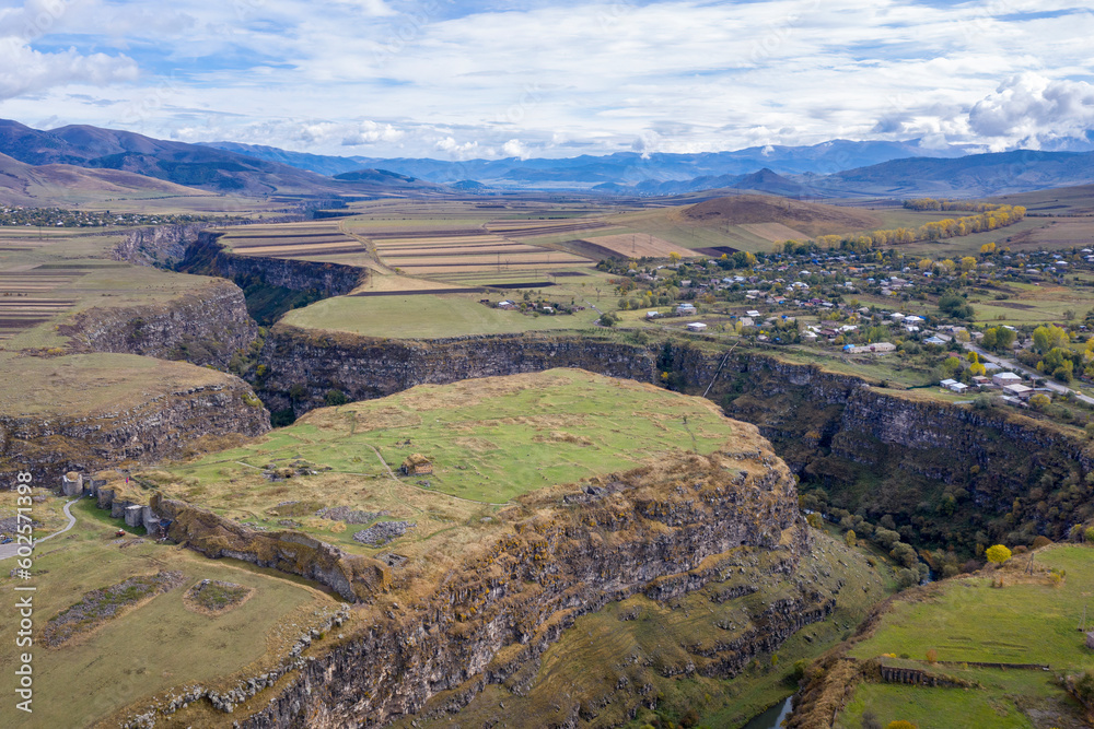 Naklejka premium Drone view of Loriberd fortres and Amrakits village on autumn day. Lori Province, Armenia.
